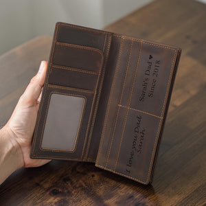 Personalized leather long wallet with custom name engraving, everyday carry flat lay