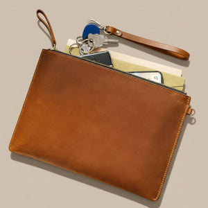 Leather wristlet pouch with detachable strap