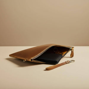 Leather zipper clutch bag in full grain leather