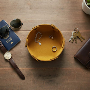 Leather catchall tray folded flat for travel