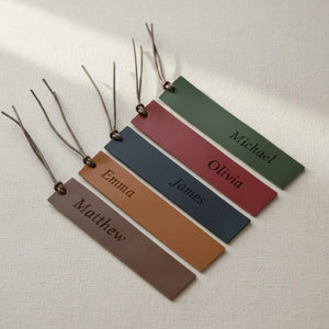 Personalized leather bookmarks in five colors with engraved names and cord tassels